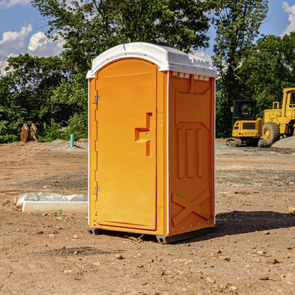 how often are the porta potties cleaned and serviced during a rental period in Carroll